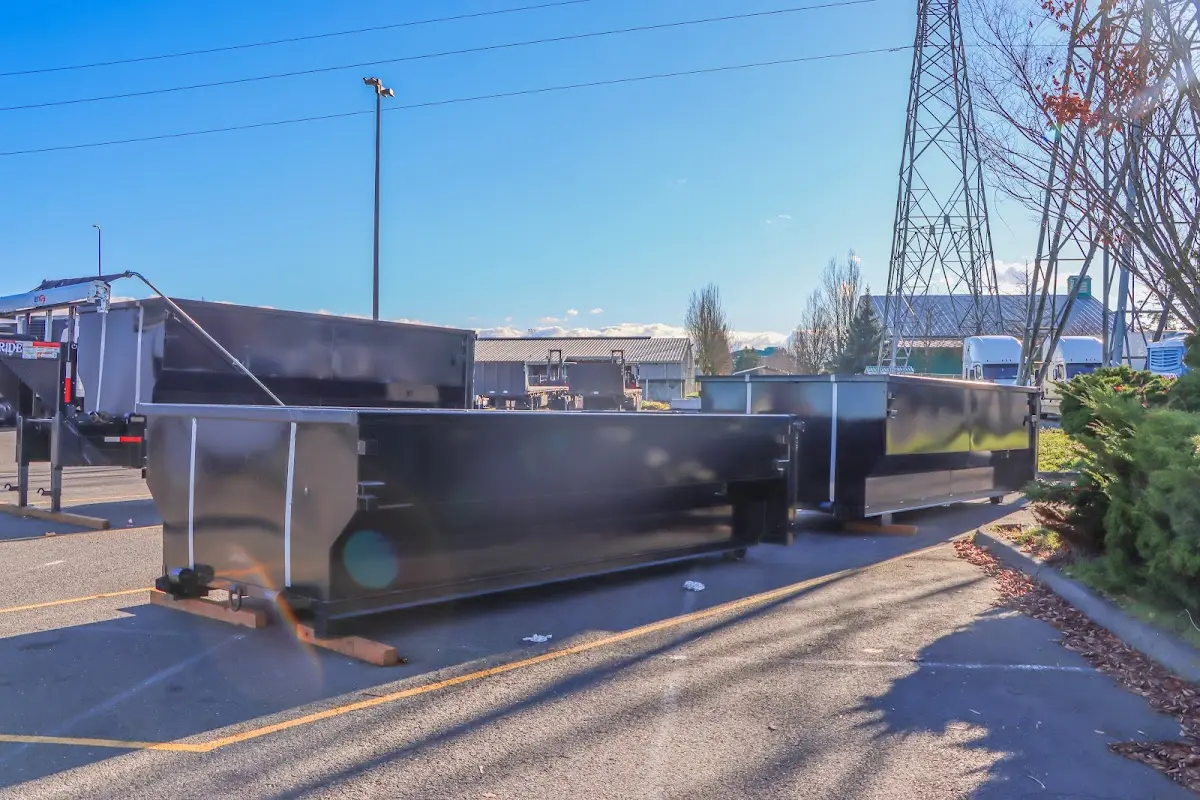 Roll-off dumpster ready for waste disposal at job site for 2 Yard Dumpster Rental in McFarland